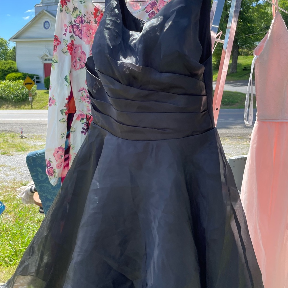 Retro dress, brand new w/ tags. Hits right at knees. Super cool, unique & pretty